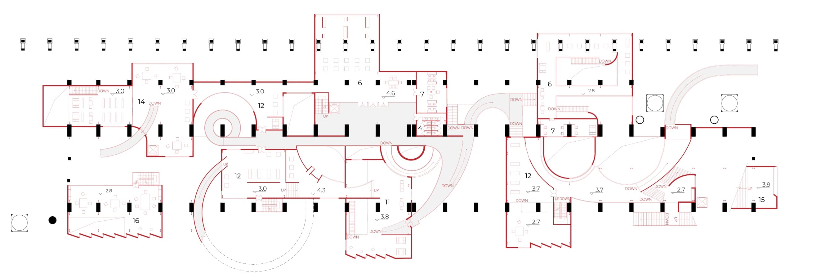 Second-floor plan showing a curving elevated route, circular openings, rooms, and changing floor levels within the factory grid