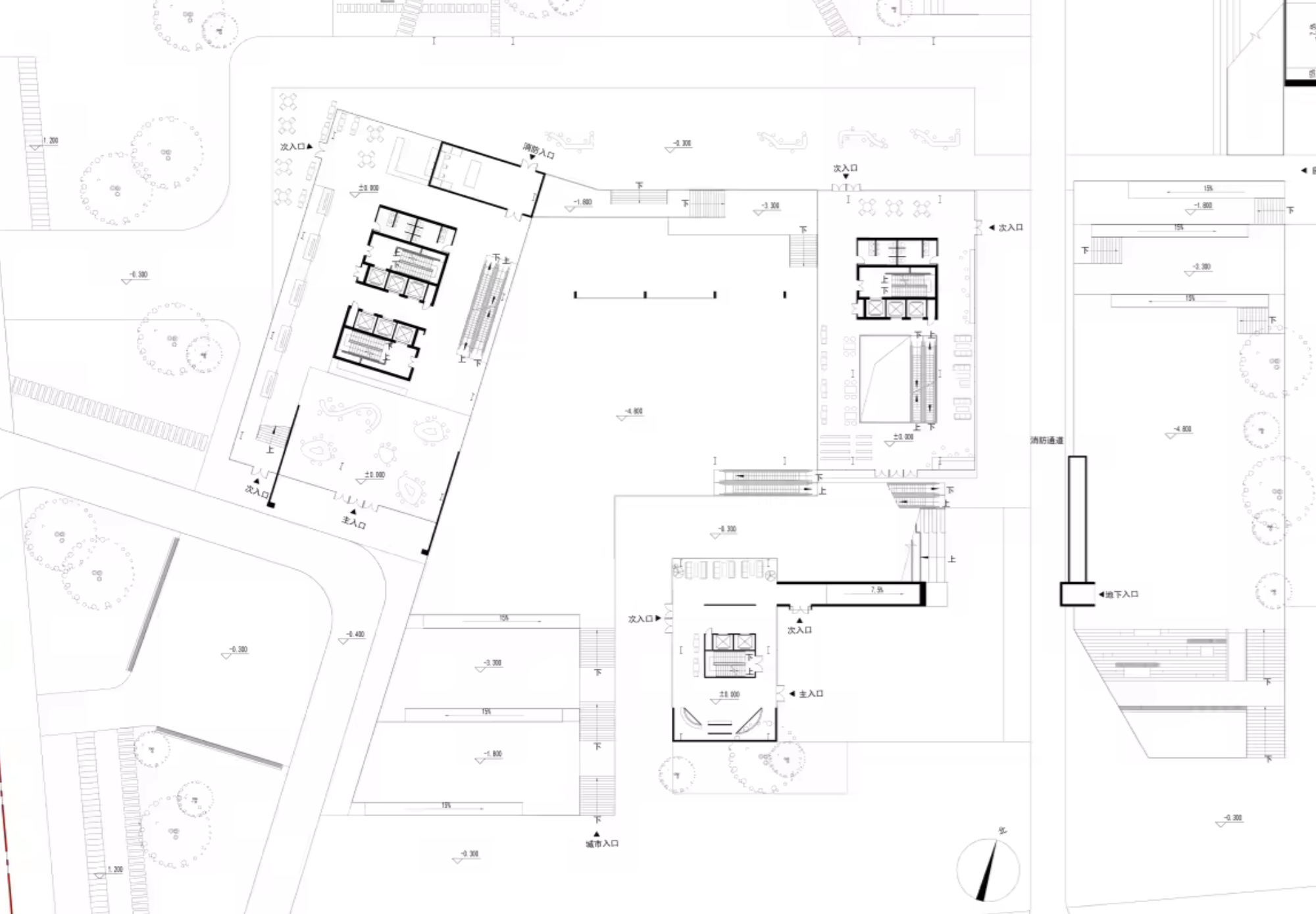 Ground-floor plan with separated building volumes around a large open space